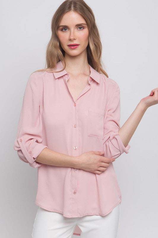 Blusa rosa holgada de botones con manga ajustable