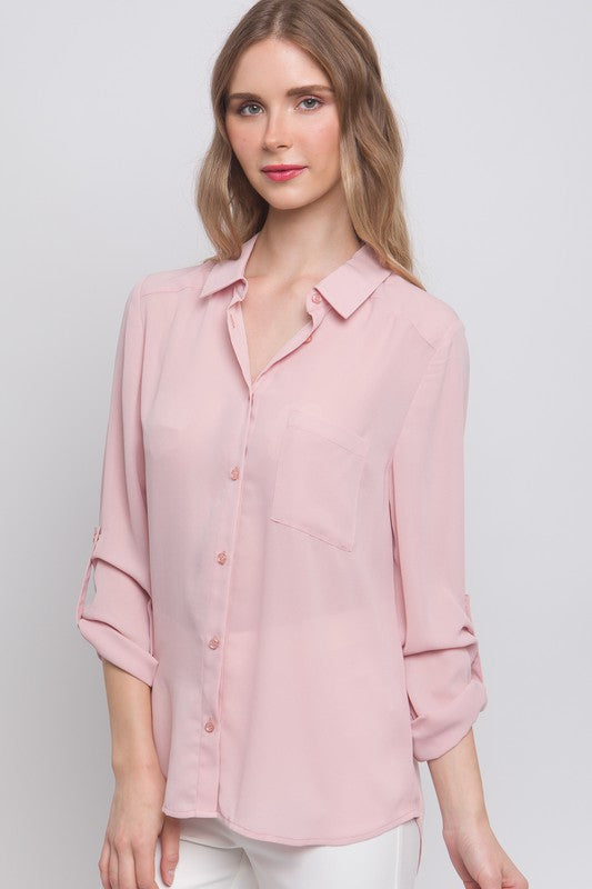 Blusa rosa holgada de botones con manga ajustable