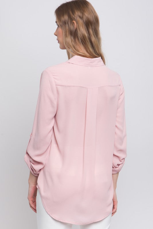 Blusa rosa holgada de botones con manga ajustable