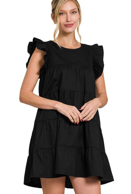 Vestido Negro con Volantes y Mangas Onduladas