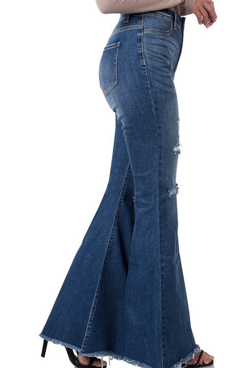 Pantalón acampanado de mezclilla con tiro alto y desgaste