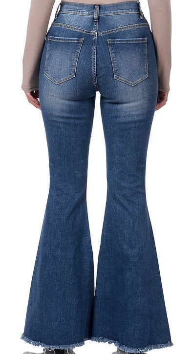 Pantalón acampanado de mezclilla con tiro alto y desgaste