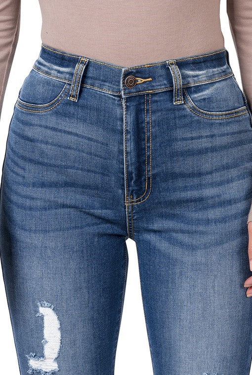 Pantalón acampanado de mezclilla con tiro alto y desgaste